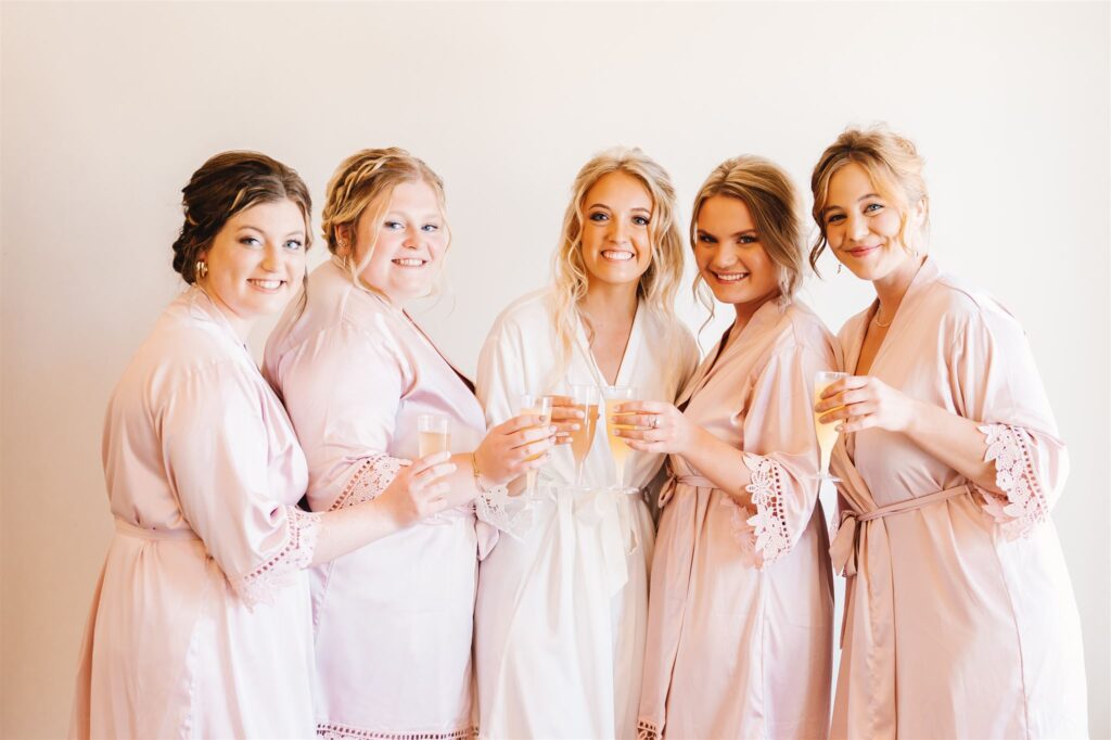 Bride and bridesmaids getting ready