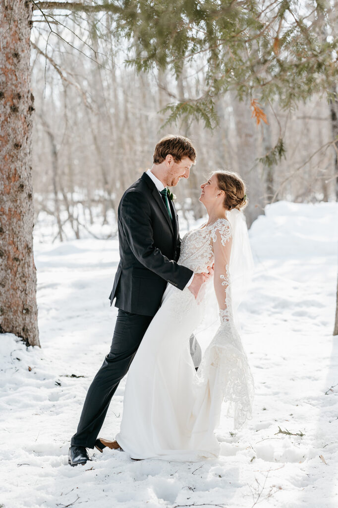 Bride and groom winter wedding portrait