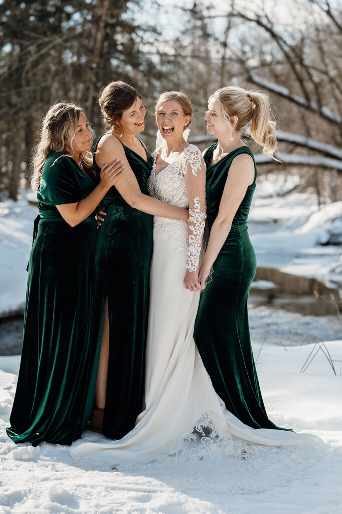 Bride and bridesmaids, dark green winter bridesmaids dresses