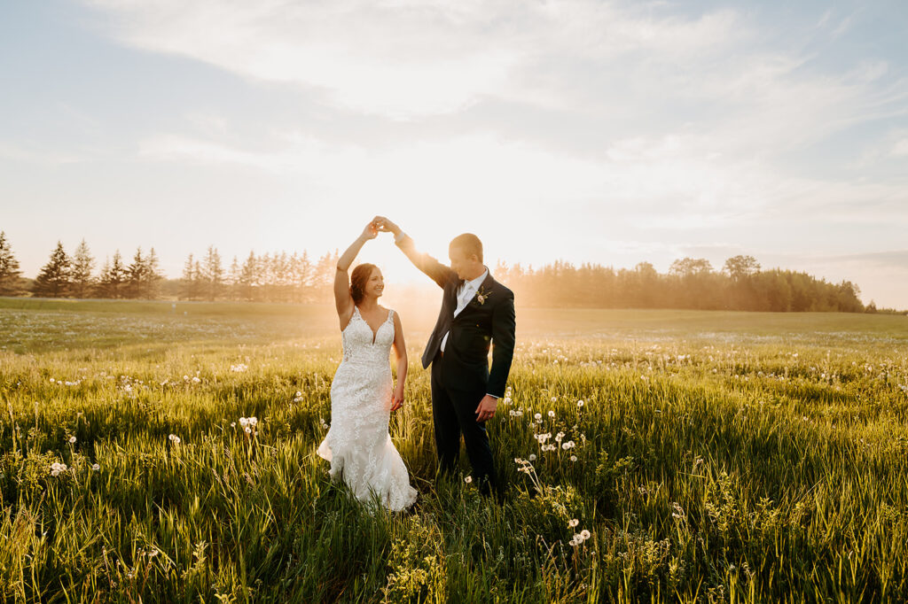 bride and groom golden hour in a field wedding portrait