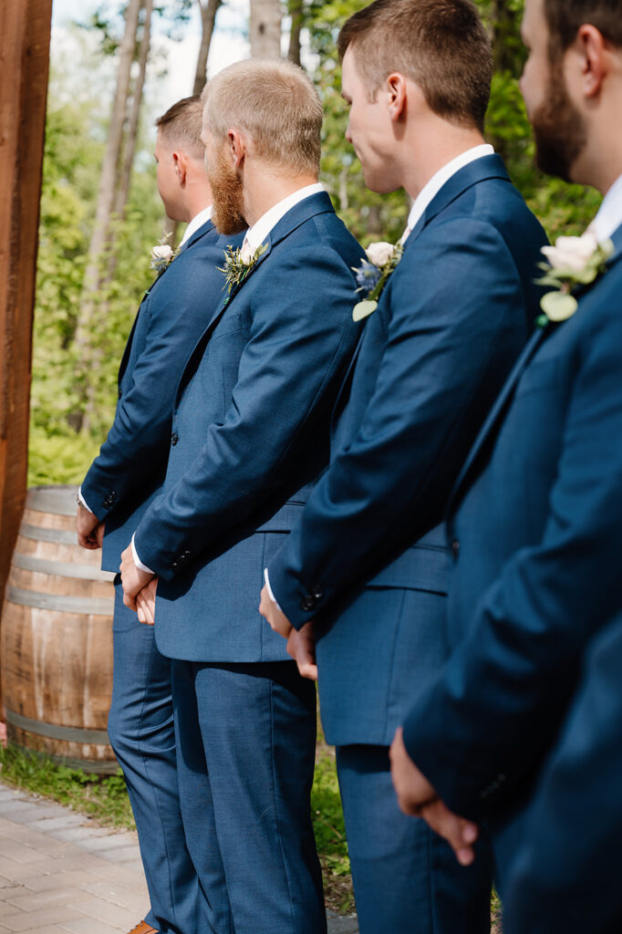 groomsmen during ceremony