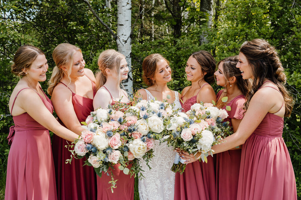 bride and bridesmaids, bridesmaids wearing magenta dresses