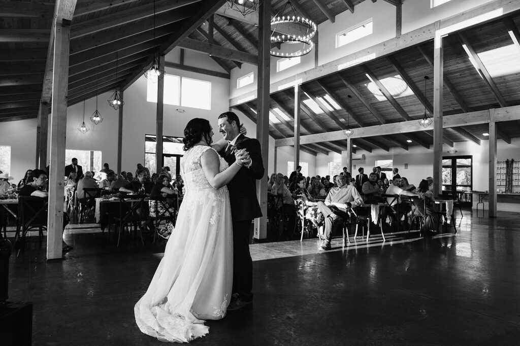 Black and white photo of bride and groom's first dance