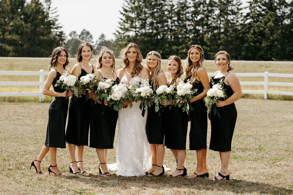 bride and bridesmaids photo, bridesmaids wearing elegant, black bridesmaid dresses