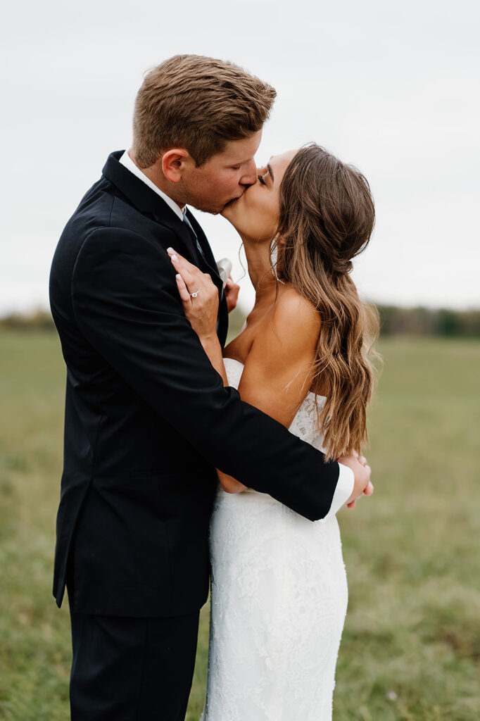 romantic bride and groom outdoor wedding portraits during their late september wedding day