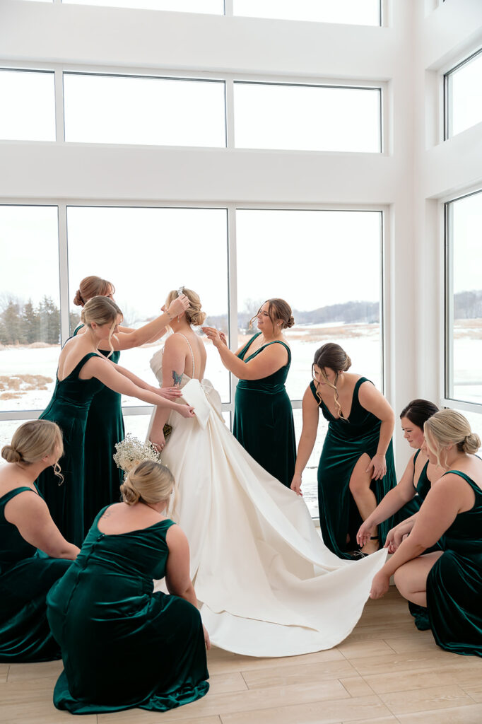 candid moment of bride and bridesmaids