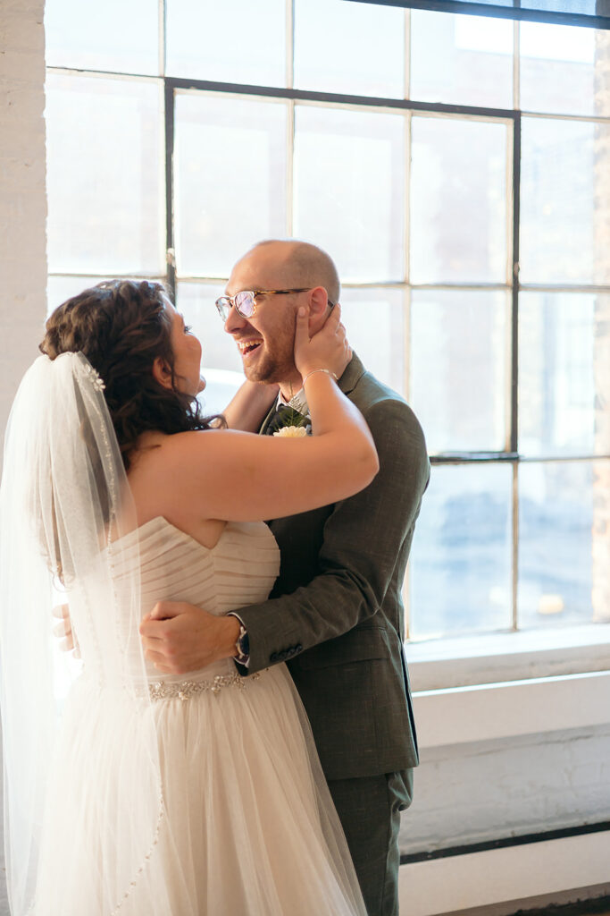 emotional bride and groom first look at the neu neu wedding venue