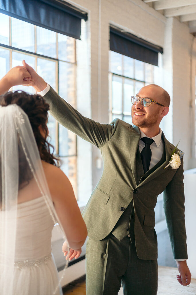 emotional bride and groom first look at the neu neu wedding venue