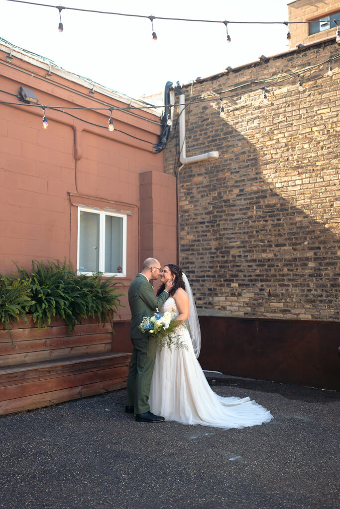 bride and groom in downtown minneapolis during their celebration at the neu neu wedding venue