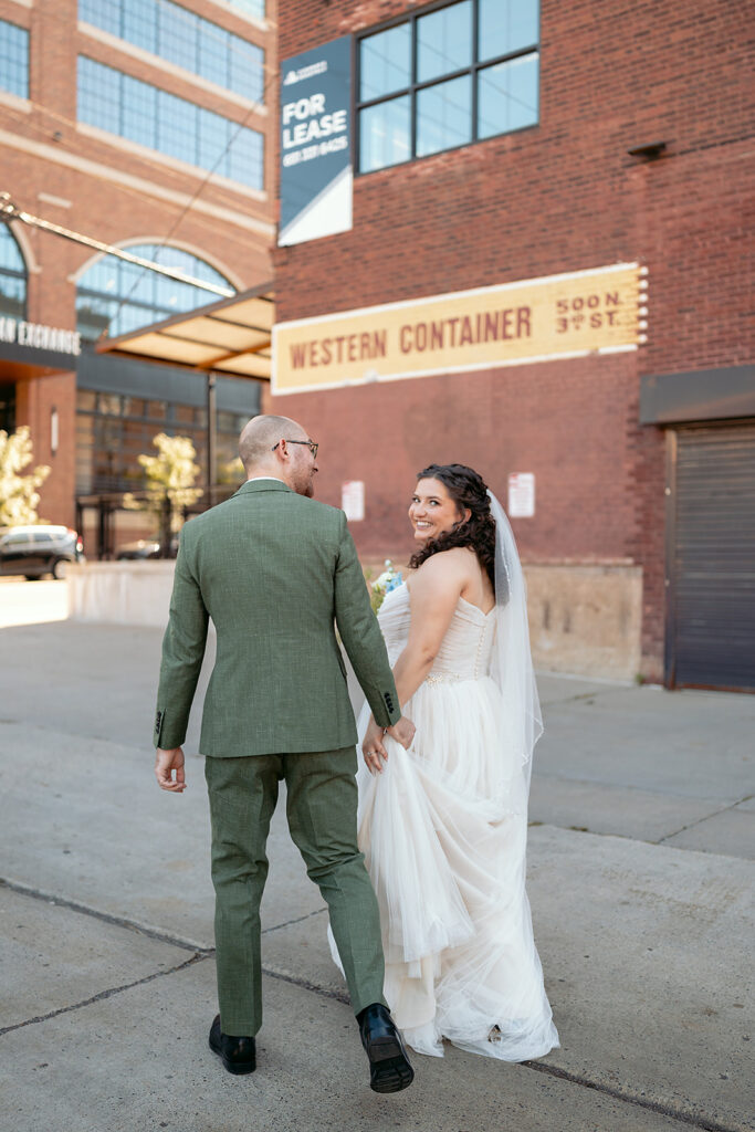 bride and groom in downtown minneapolis during their celebration at the neu neu wedding venue