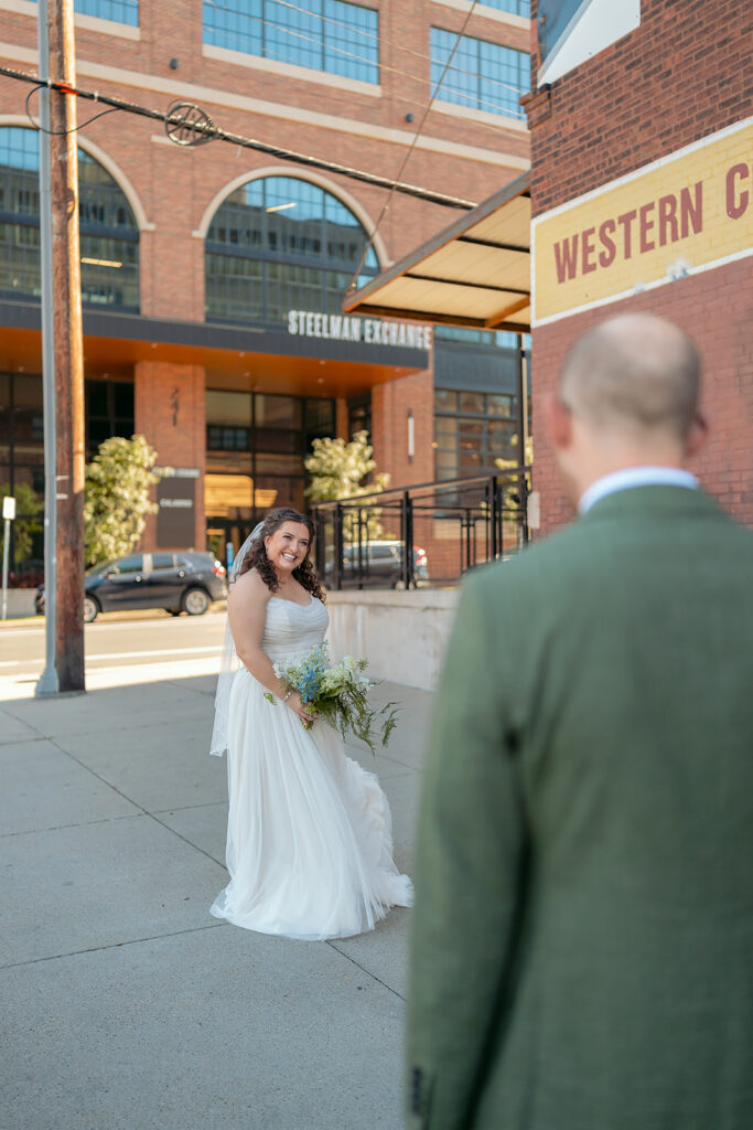 romantic bride and groom wandering in downtown minneapolis 