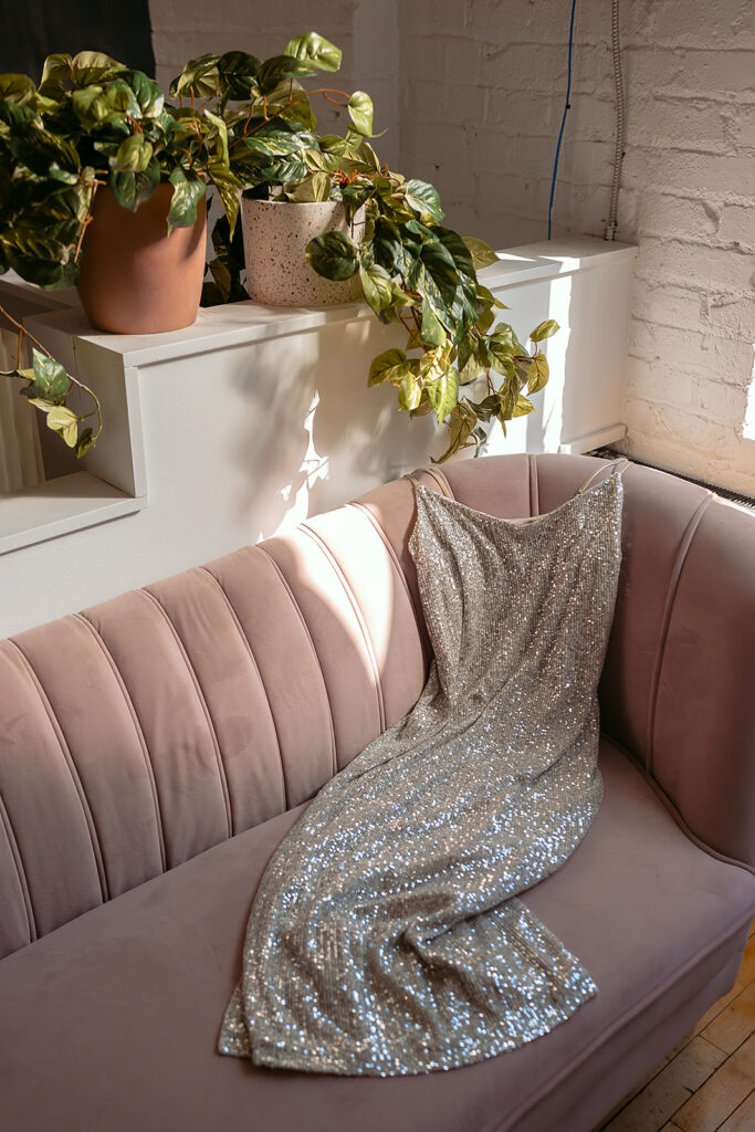 sparkly dress on a sofa