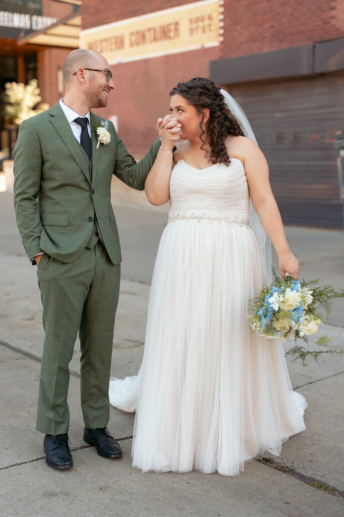 bride and groom wandering in downtown minneapolis 