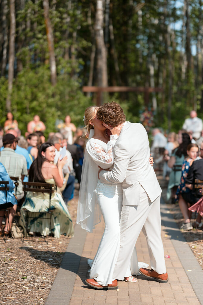 outdoor wedding ceremony with colorful spring florals