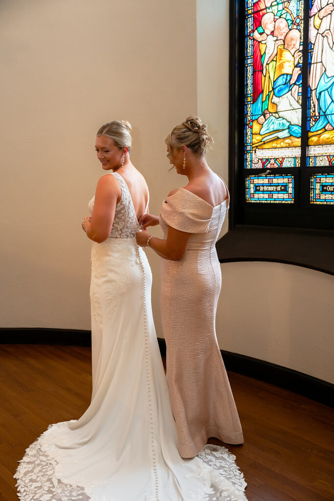 finishing touches of bride getting ready