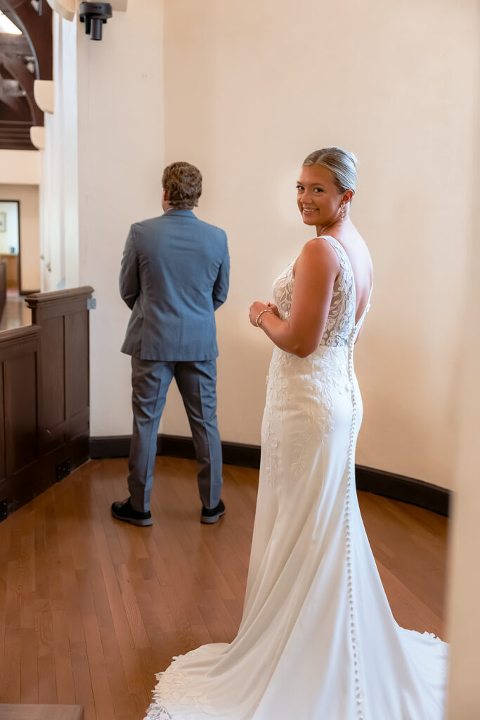 bride and groom first look inside the church