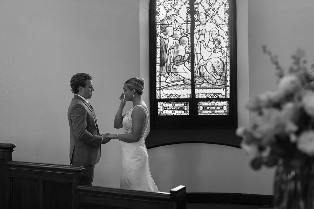 bride and groom first look inside the church