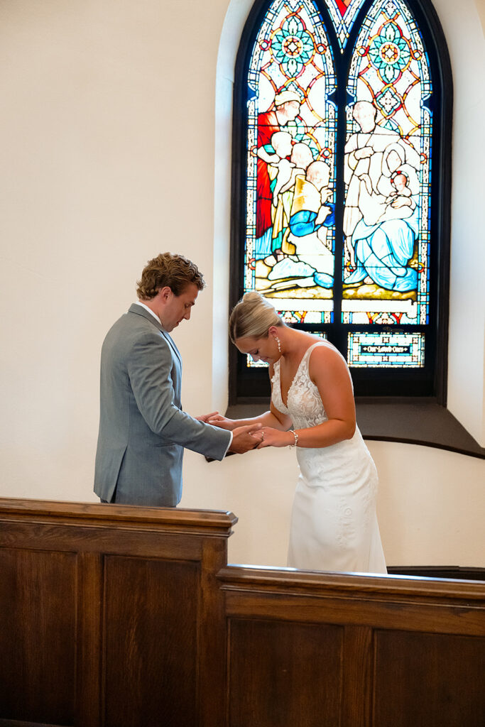 bride and groom first look inside the church
