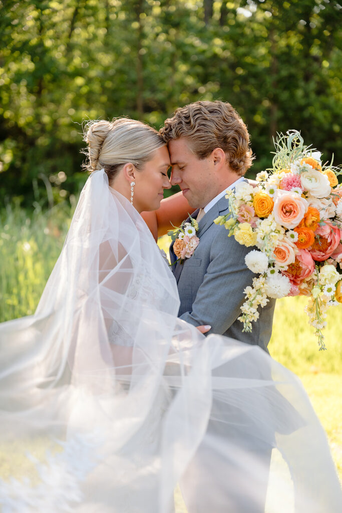 bride and groom at the golf course during their bemidji country club wedding day