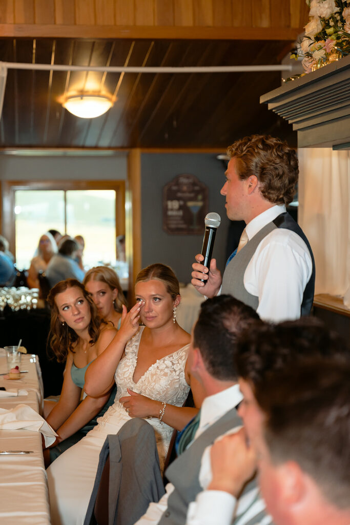 candid moments from wedding reception at the bemidji country club