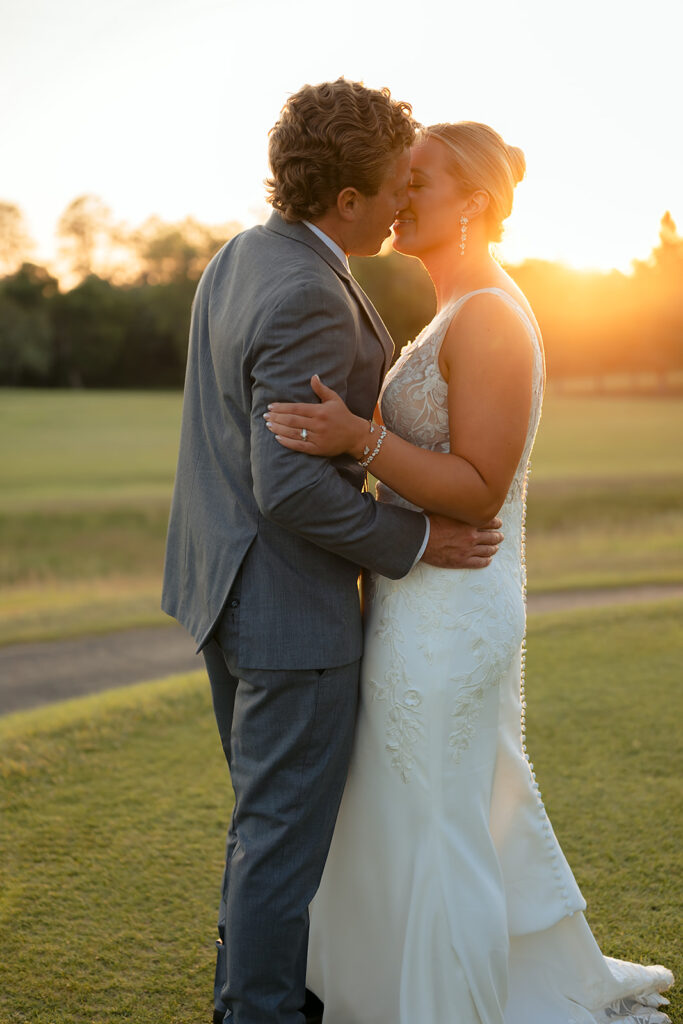 bride and groom at the golf course during their bemidji country club wedding day