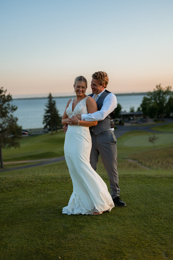 bride and groom at the golf course during their bemidji country club wedding day