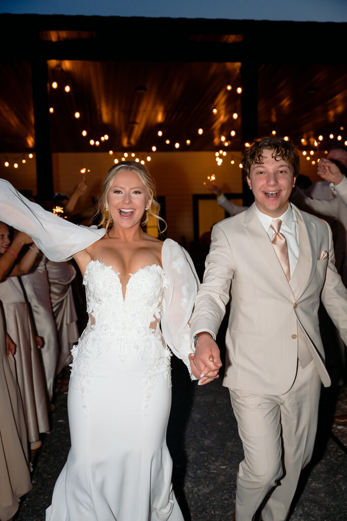 end of night bride and groom wedding exit