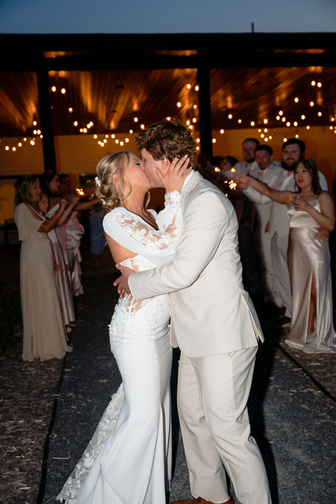 end of night bride and groom wedding exit