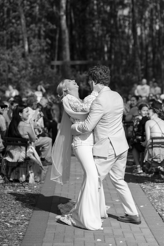 outdoor wedding ceremony with colorful spring florals