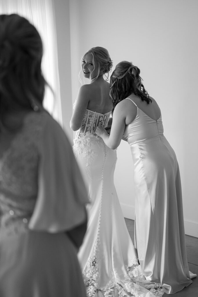 bride getting ready with her bridesmaids