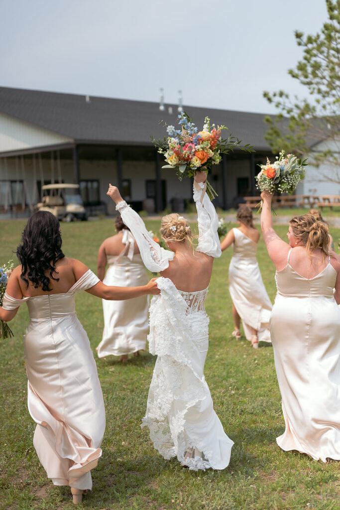 candid and emotional bride and bridesmaids first look