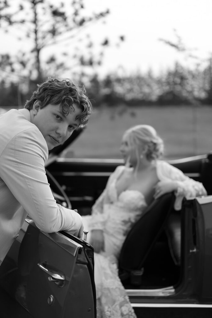 bride and groom in a vintage car during golden hour portraits