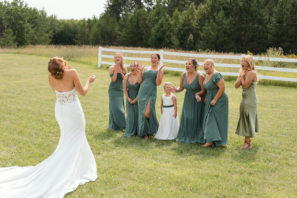 bride and bridesmaids first look