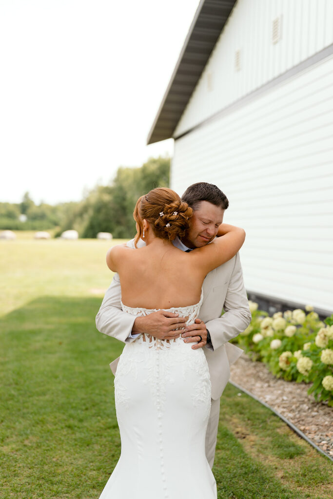 emotional bride and dad first look