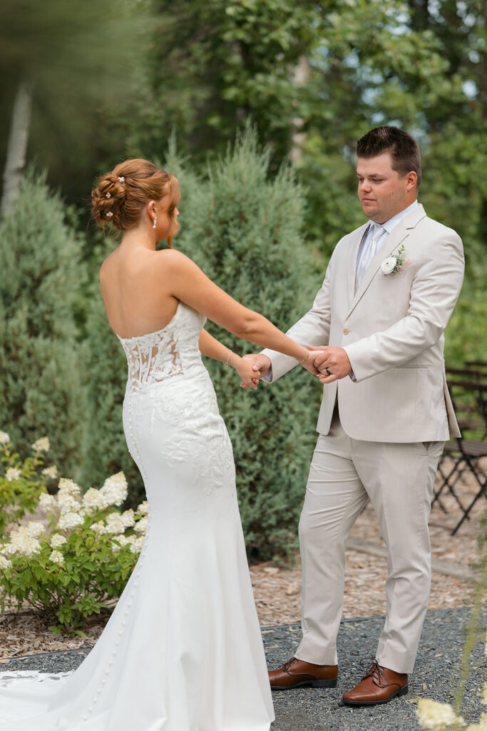 emotional bride and groom first look