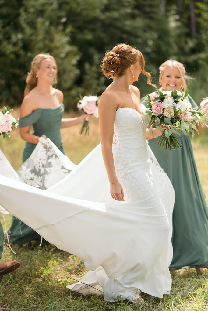 bride surrounded by bridesmaids