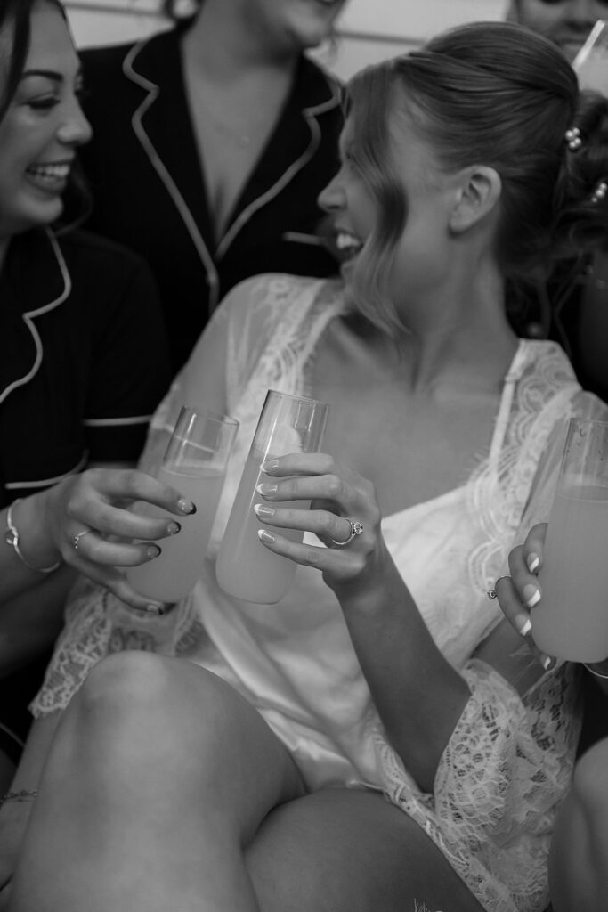 bride and bridesmaids in PJs getting ready