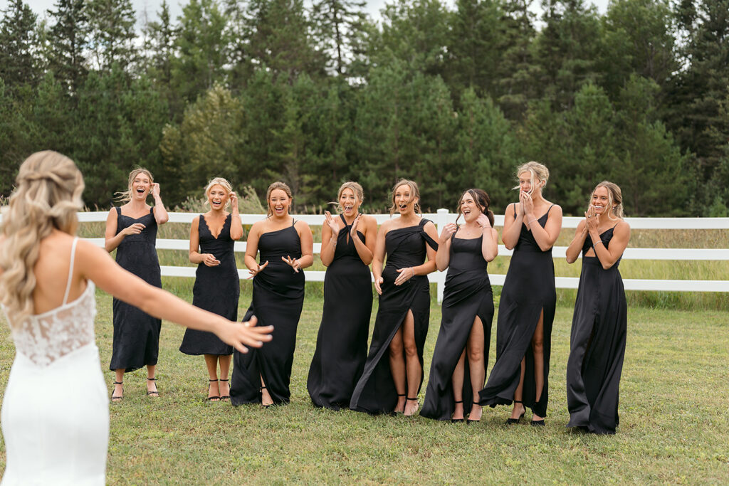 bride and bridesmaids first look