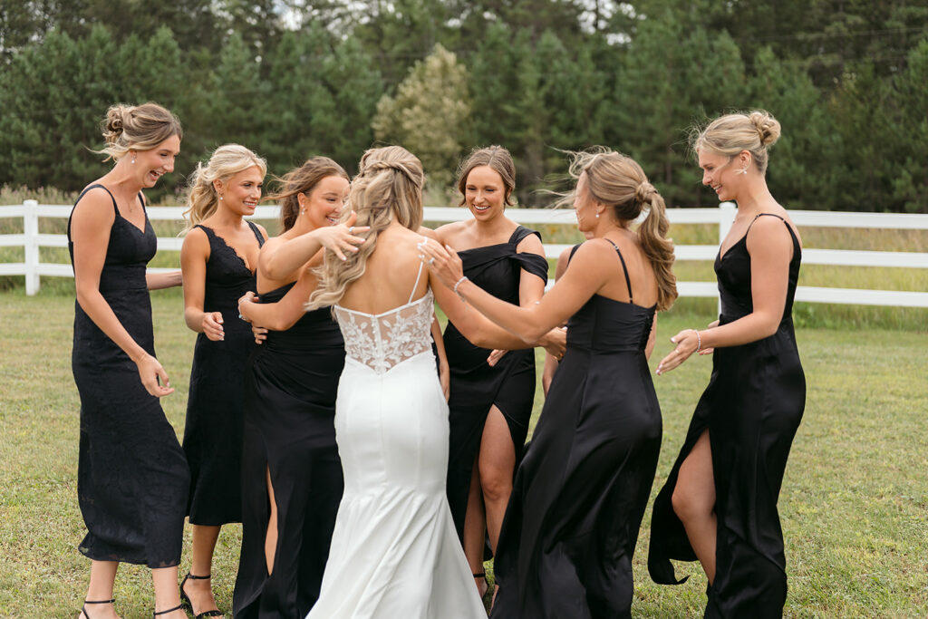bride and bridesmaids first look