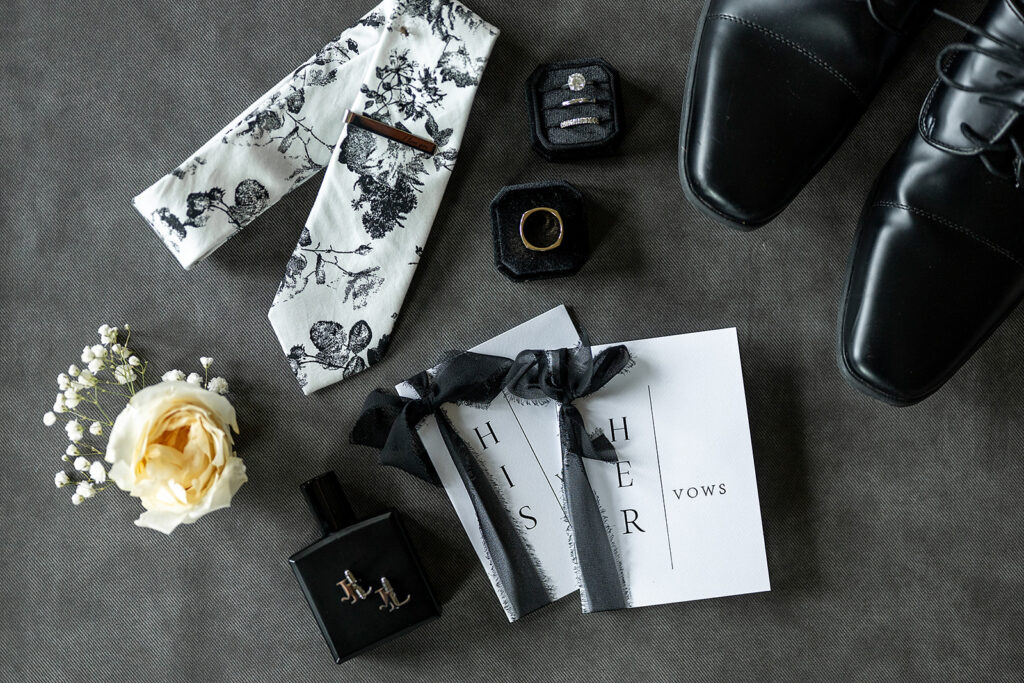 groom black and white wedding details