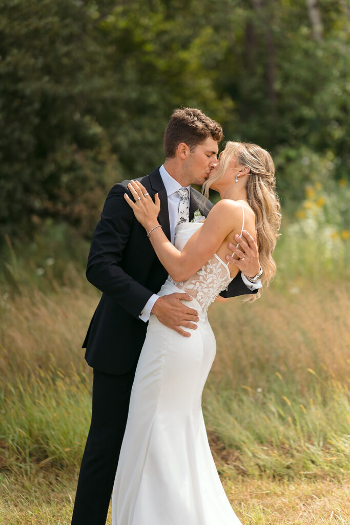 golden hour bride and groom moments in a lush field at bluebelle event venue