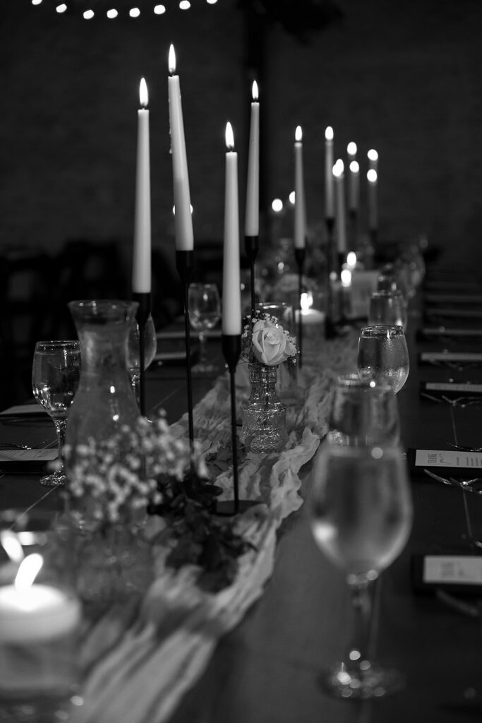 elegant black and white wedding table settings for an indoor reception at the bluebelle event venue