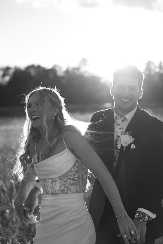 romantic rainy wedding photos at a lush field