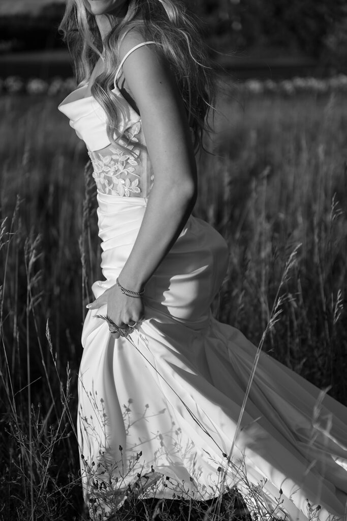 romantic rainy wedding photos at a lush field