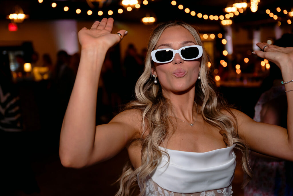bride having fun during during the reception
