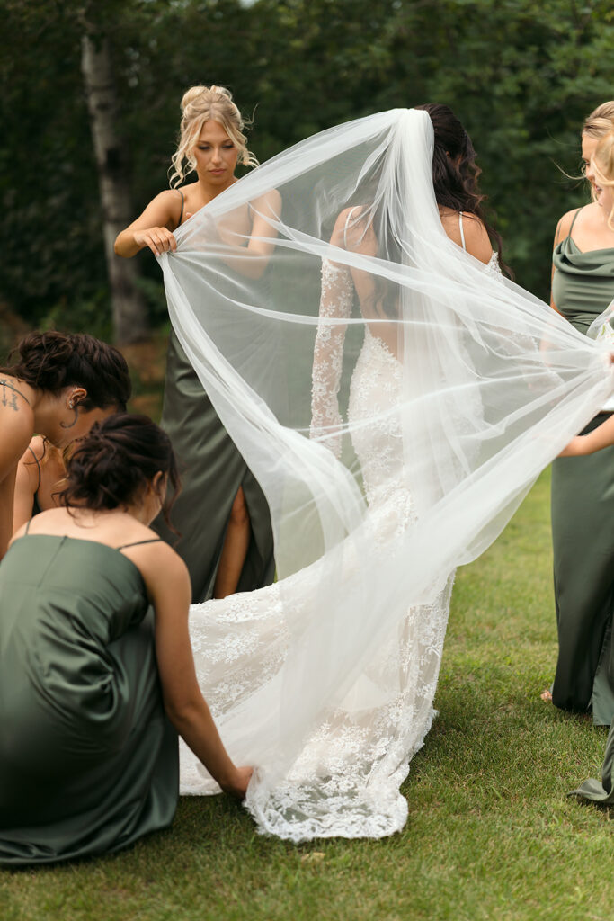 bride and bridesmaids first look