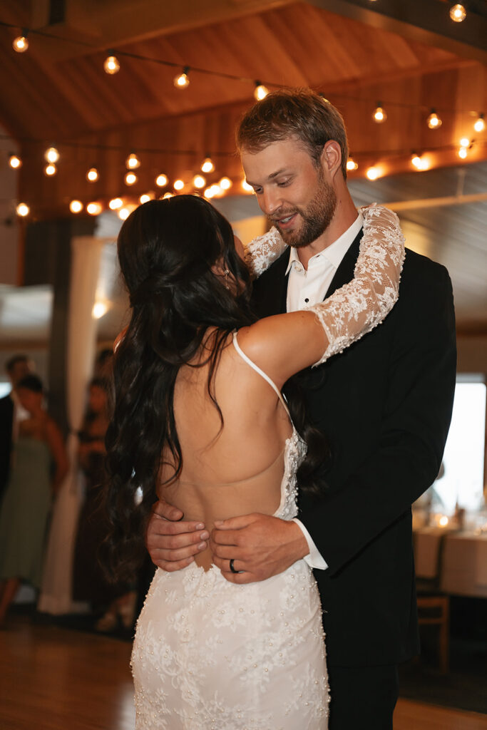 bride and groom dancing during the reception at Bemidji Town and Country Club