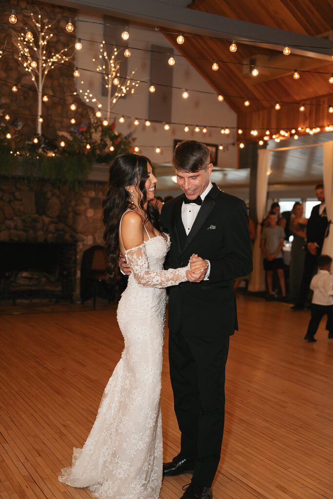 bride and dad dancing during the reception at Bemidji Town and Country Club
