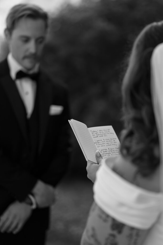 first look and private vow exchange in front of Beltrami County Courthouse during their Minnesota courthouse wedding