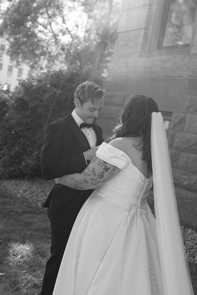 bride and groom exchanging private vows during their minnesota courthouse wedding